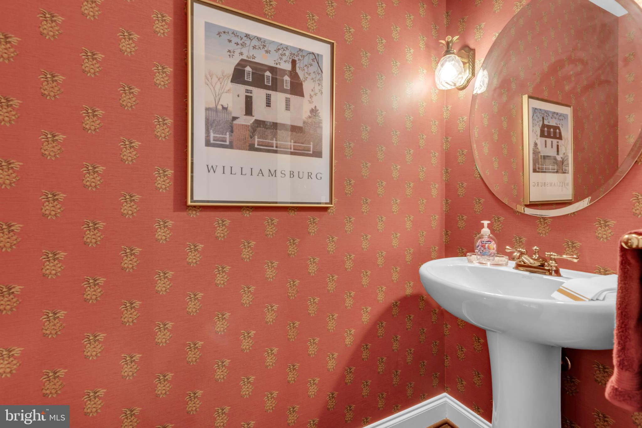 10 Sailors Way Annapolis, MD 21403 - Photo 13 of 36 a bathroom with a sink and a mirror