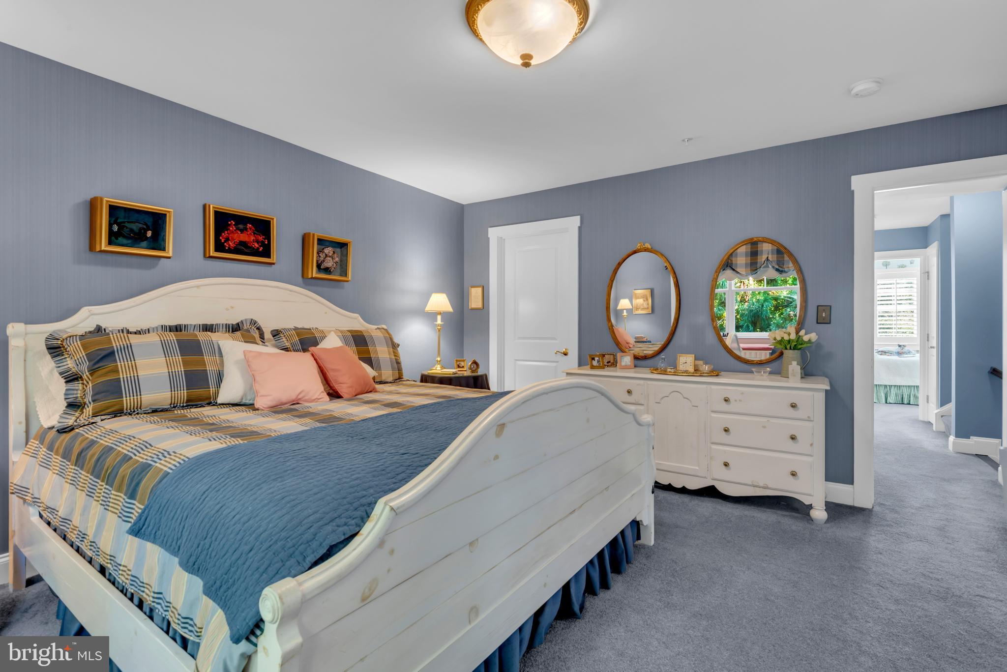 10 Sailors Way Annapolis, MD 21403 - Photo 16 of 36 a bedroom with a bed and a dresser