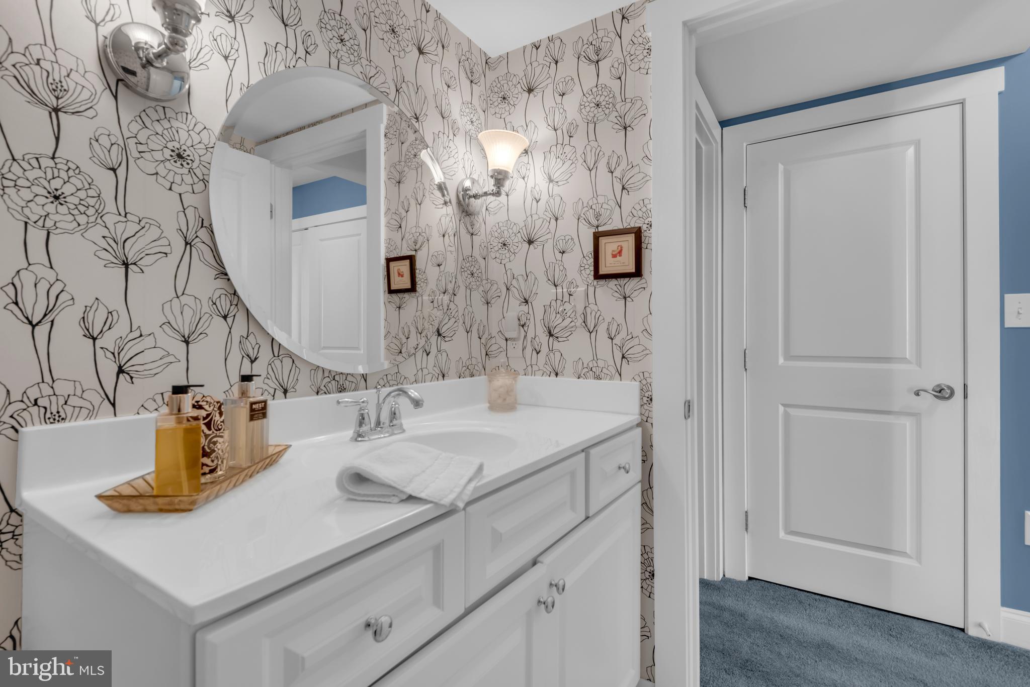 10 Sailors Way Annapolis, MD 21403 - Photo 24 of 36 a bathroom with a sink and vanity