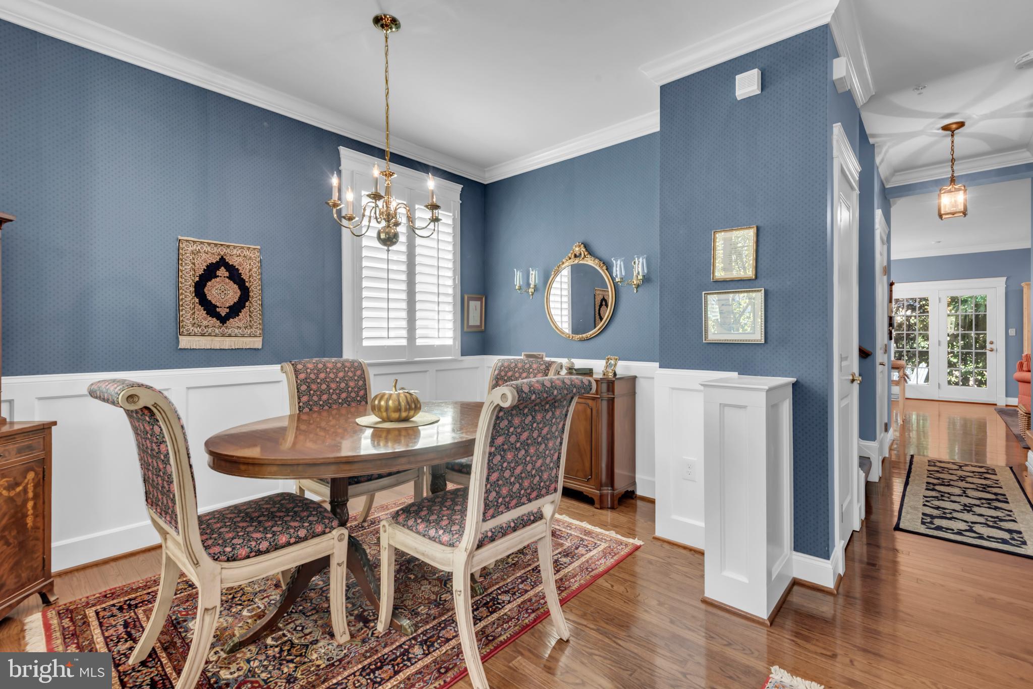 10 Sailors Way Annapolis, MD 21403 - Photo 3 of 36 a view of a dining room with furniture window and wooden floor