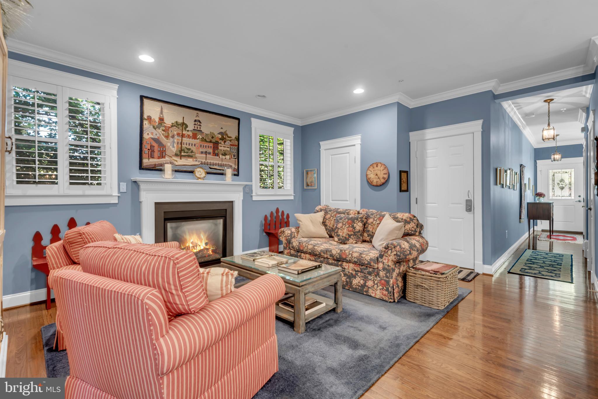 10 Sailors Way Annapolis, MD 21403 - Photo 9 of 36 a living room with furniture and a fireplace