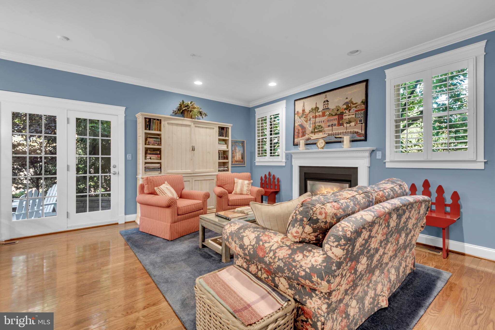 10 Sailors Way Annapolis, MD 21403 - Photo 10 of 36 a living room with furniture large window and red walls