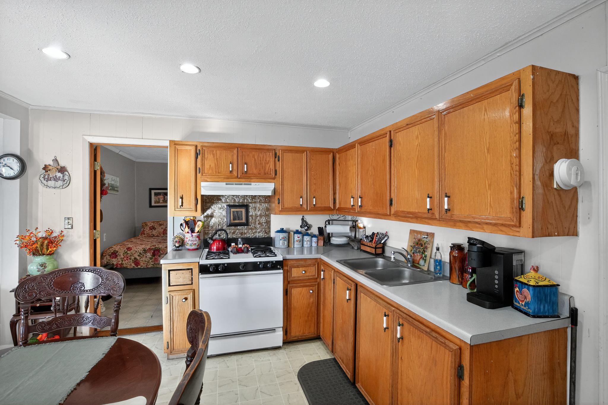 1309 Blackjack Street Lockhart, TX 78644 - Photo 9 of 15 a kitchen with a sink cabinets and window