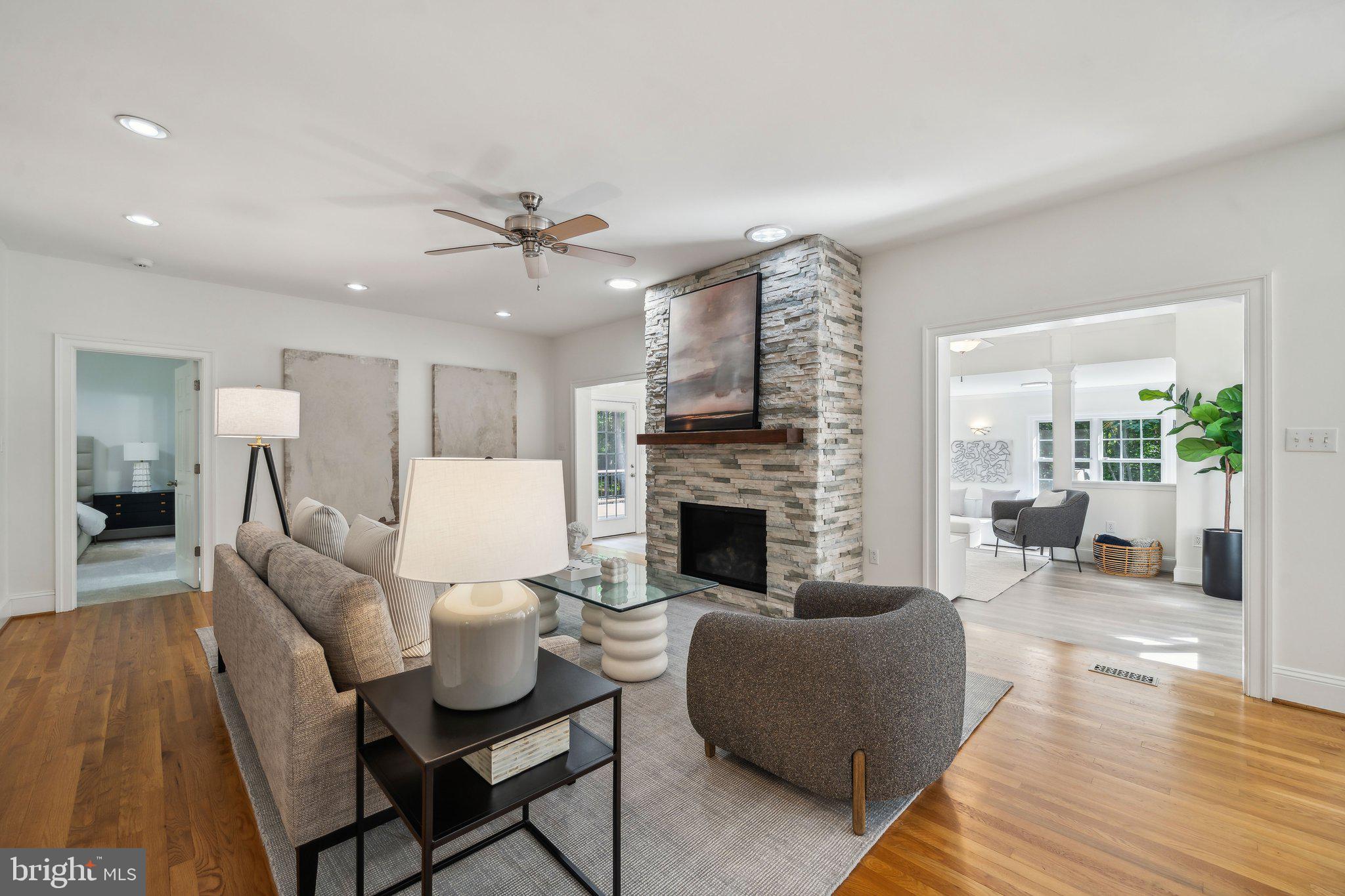 15130 Deep Spring Drive Montpelier, VA 23192 - Photo 17 of 66 a living room with furniture fireplace and wooden floor