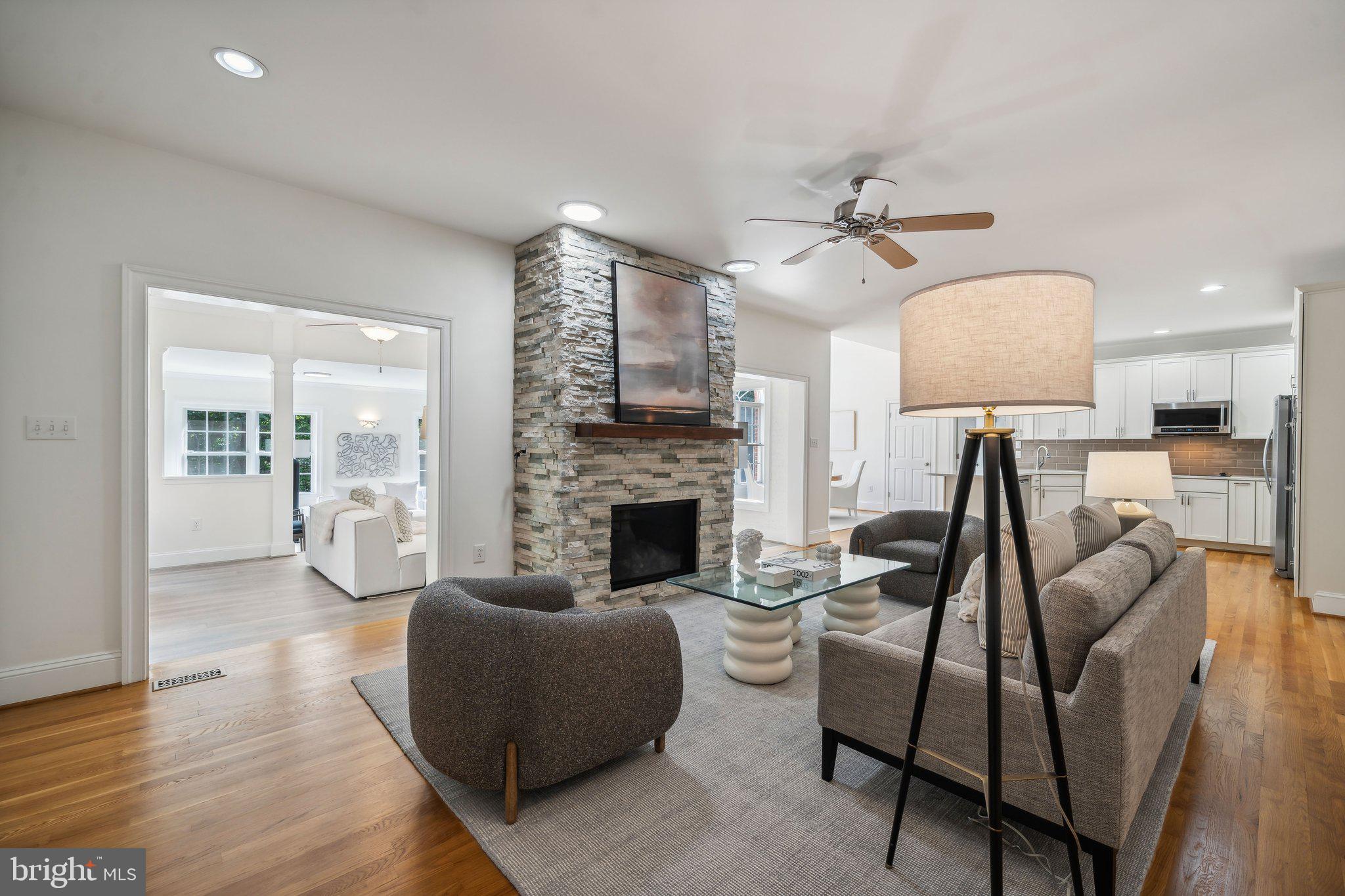 15130 Deep Spring Drive Montpelier, VA 23192 - Photo 18 of 66 a living room with furniture and a fireplace
