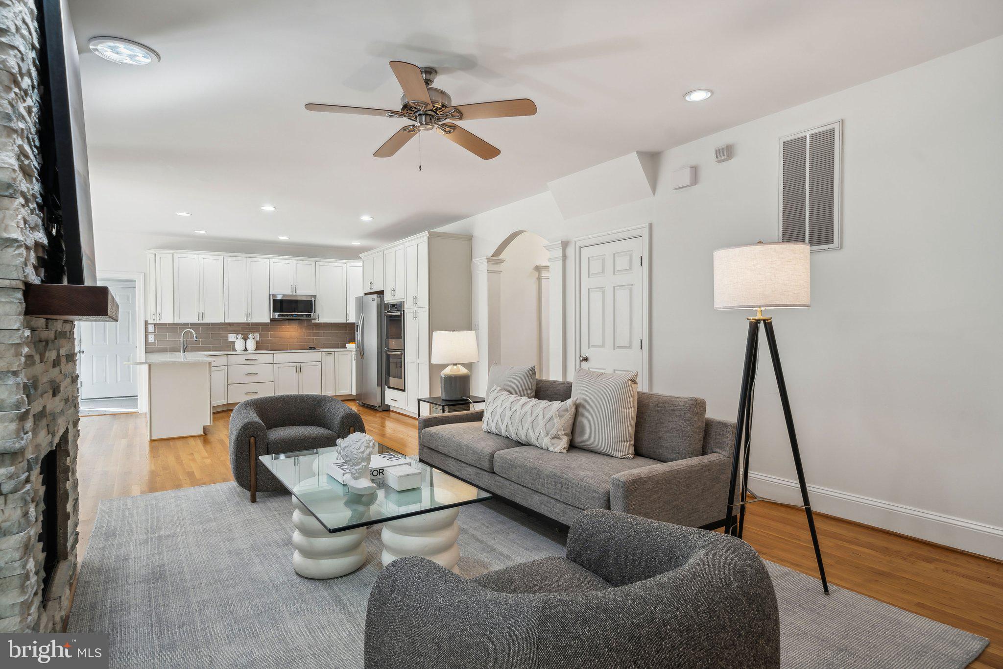 15130 Deep Spring Drive Montpelier, VA 23192 - Photo 19 of 66 a living room with furniture and a wooden floor