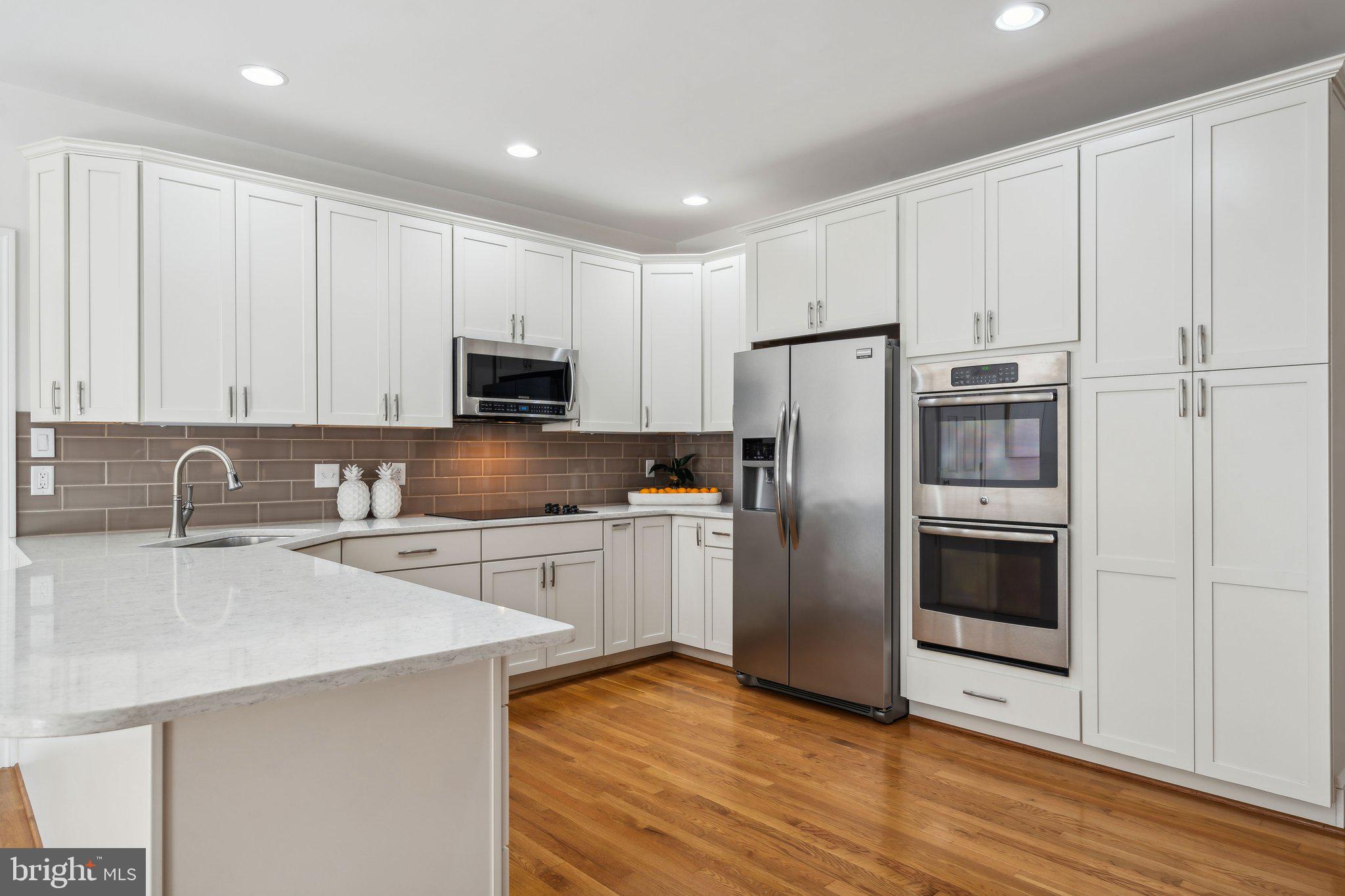 15130 Deep Spring Drive Montpelier, VA 23192 - Photo 21 of 66 a kitchen with a refrigerator sink and microwave