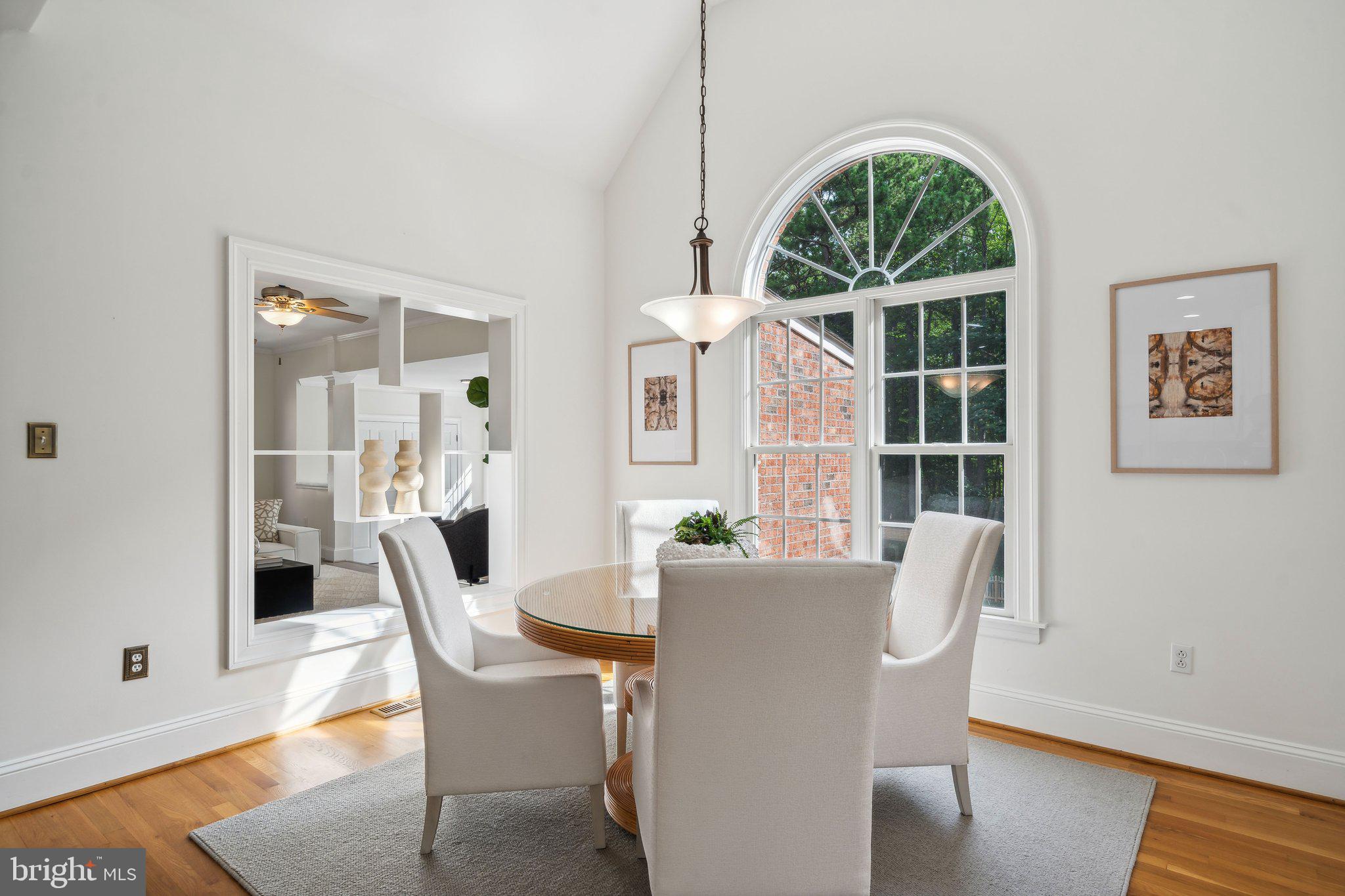15130 Deep Spring Drive Montpelier, VA 23192 - Photo 23 of 66 a view of a dining room with furniture window and wooden floor