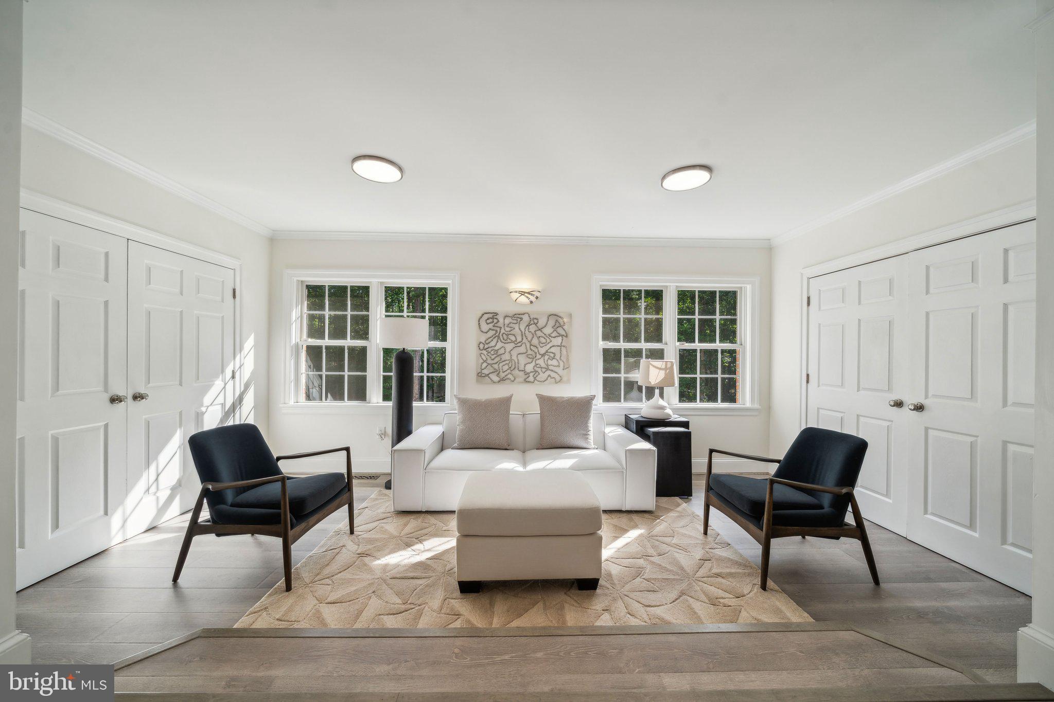 15130 Deep Spring Drive Montpelier, VA 23192 - Photo 26 of 66 a living room with furniture and a large window