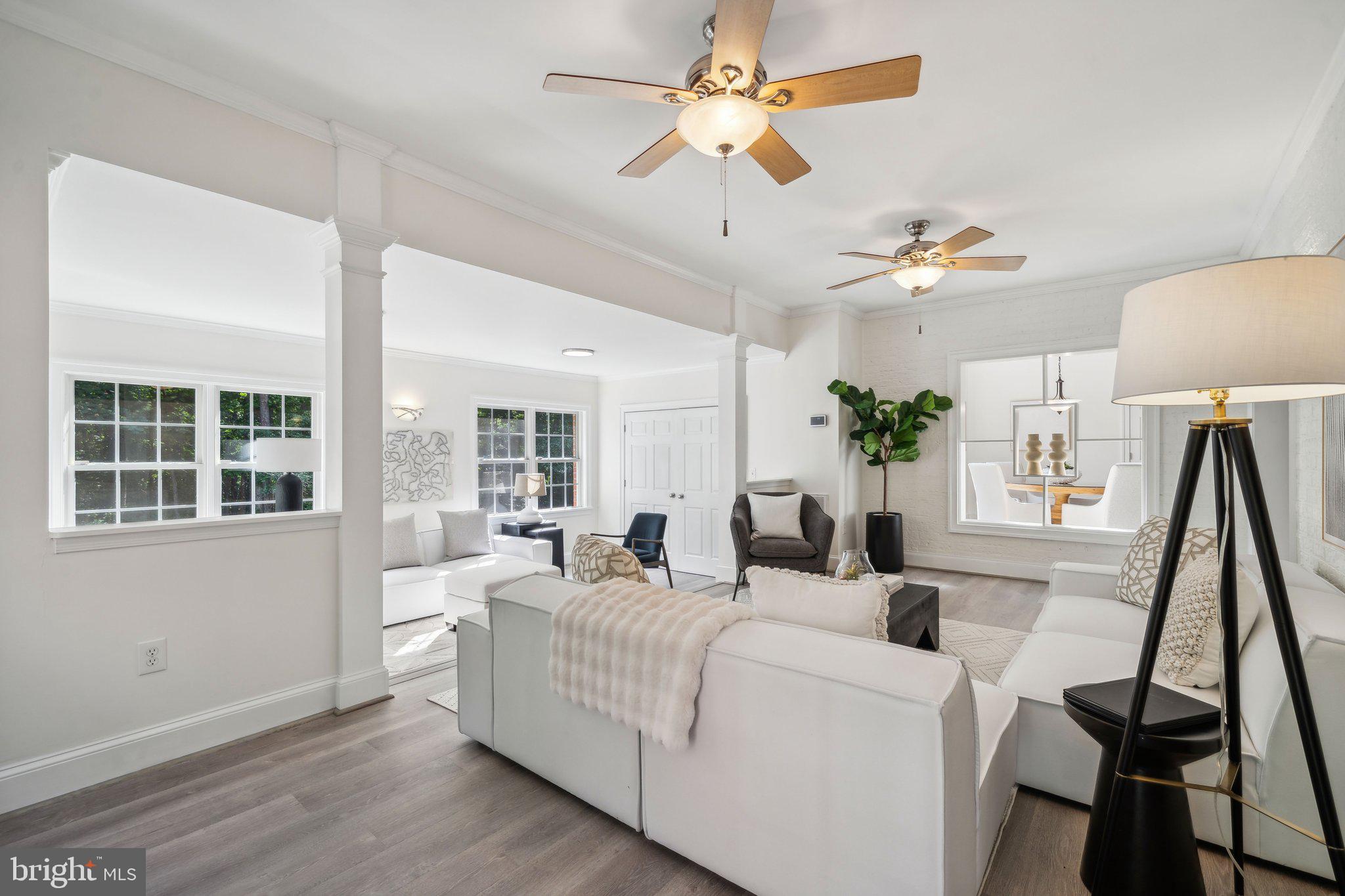 15130 Deep Spring Drive Montpelier, VA 23192 - Photo 27 of 66 a living room with furniture and a large window