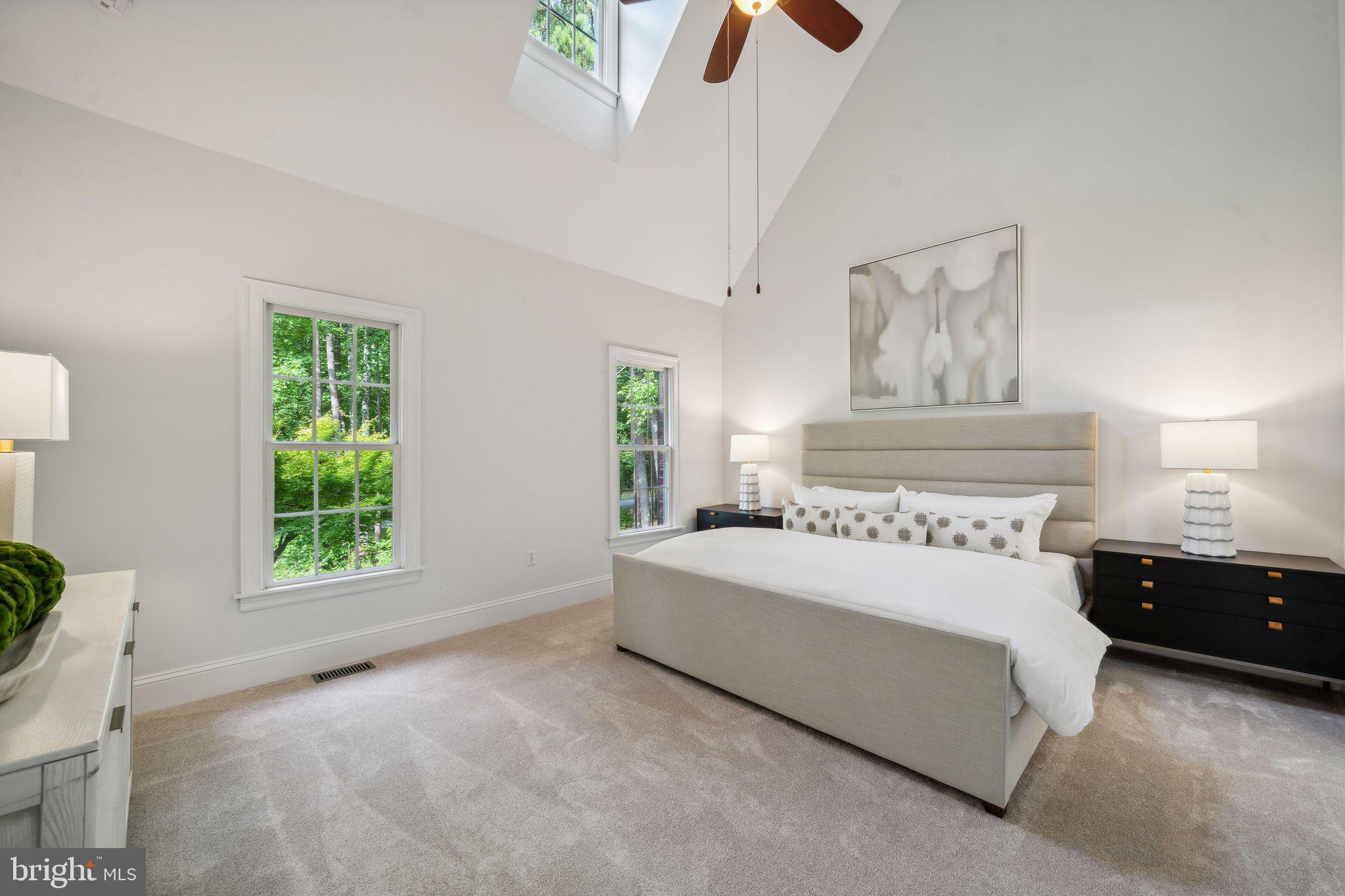 15130 Deep Spring Drive Montpelier, VA 23192 - Photo 30 of 66 a spacious bedroom with a bed and a window