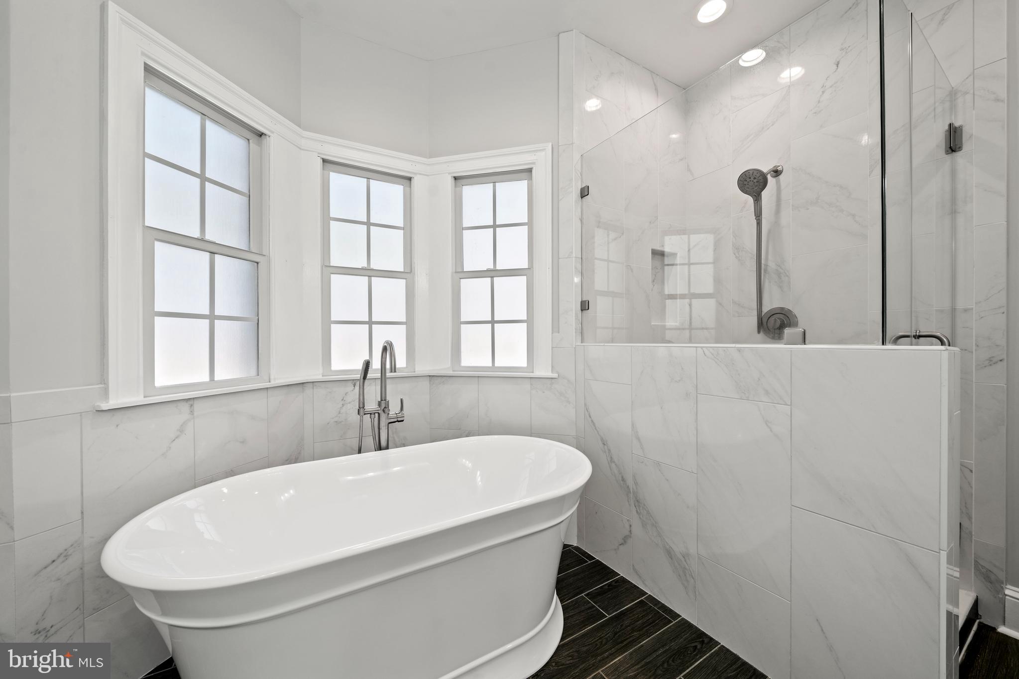 15130 Deep Spring Drive Montpelier, VA 23192 - Photo 33 of 66 a white bath tub sitting next to a white sink