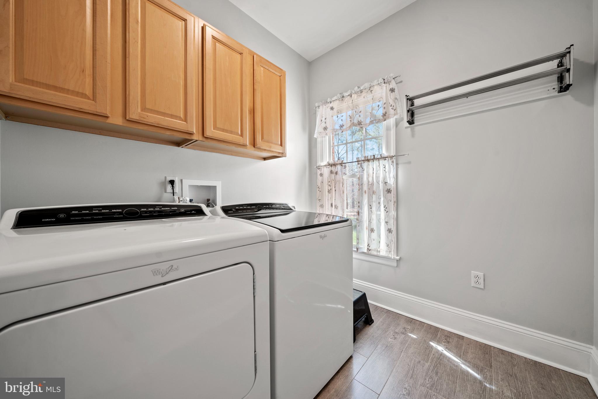 15130 Deep Spring Drive Montpelier, VA 23192 - Photo 35 of 66 a utility room with dryer and washer