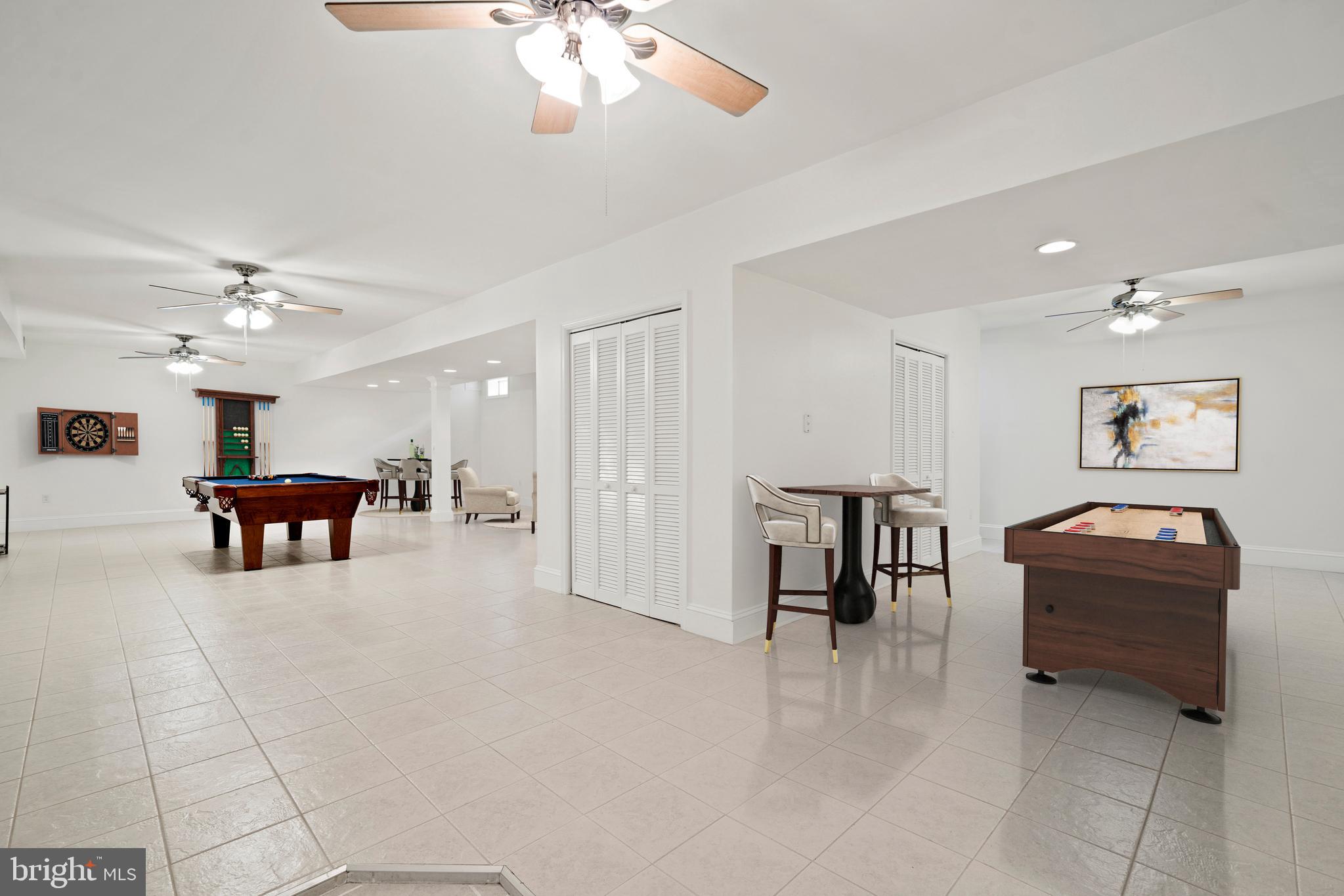 15130 Deep Spring Drive Montpelier, VA 23192 - Photo 48 of 66 a living room with furniture and a chandelier