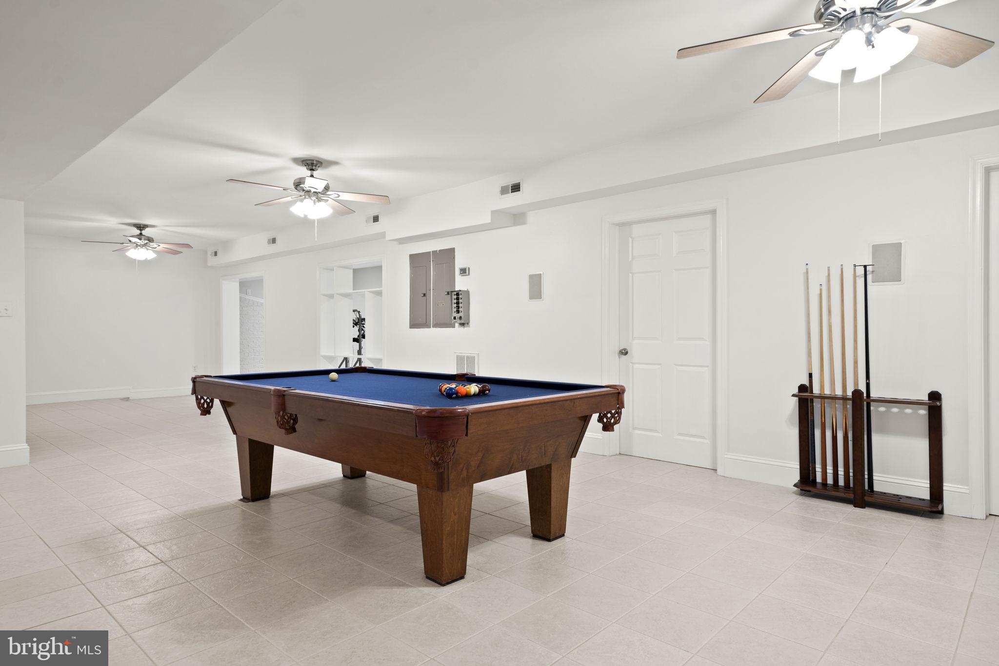 15130 Deep Spring Drive Montpelier, VA 23192 - Photo 49 of 66 a room with pool table and wooden floor