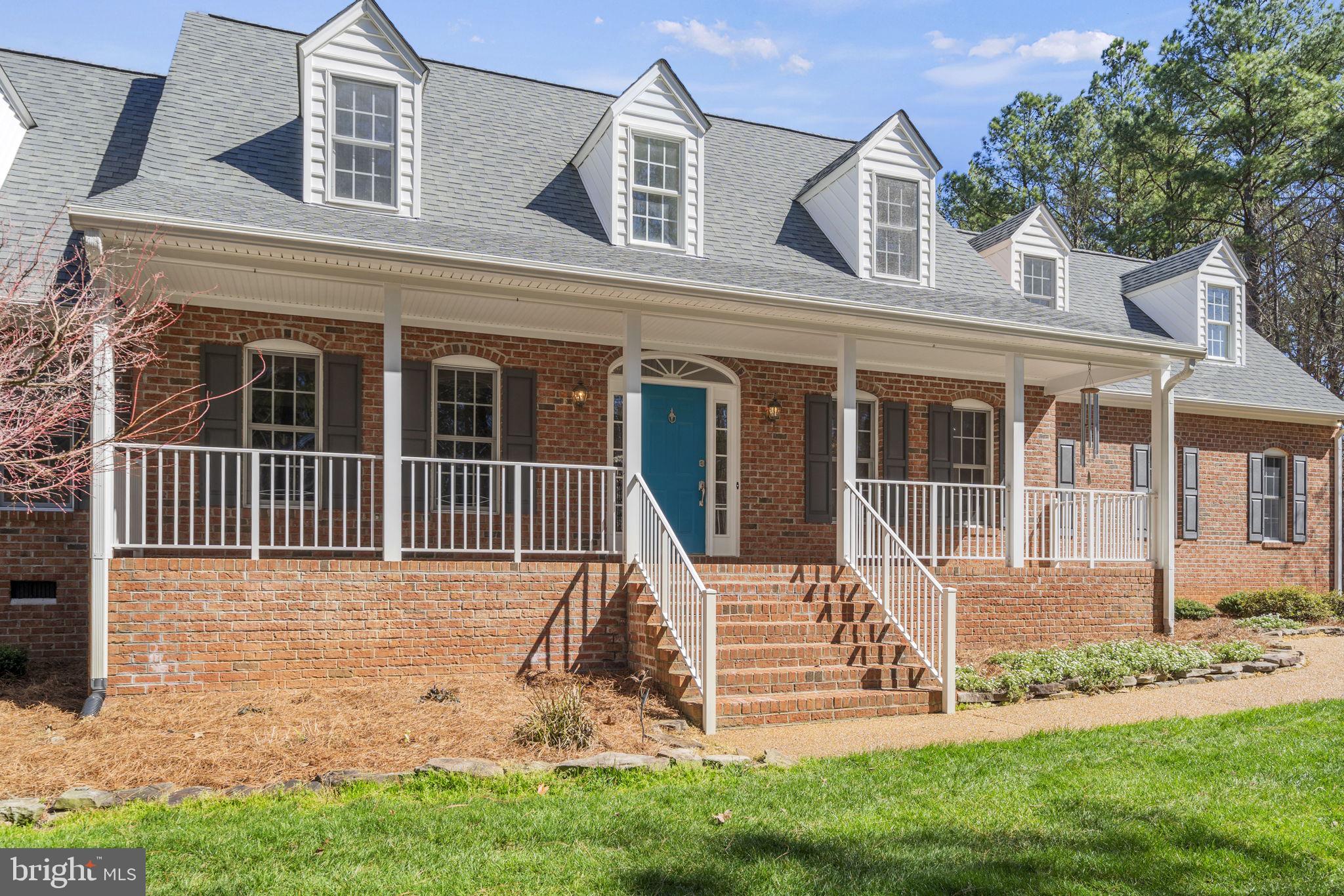 15130 Deep Spring Drive Montpelier, VA 23192 - Photo 65 of 66 front view of a house with a yard