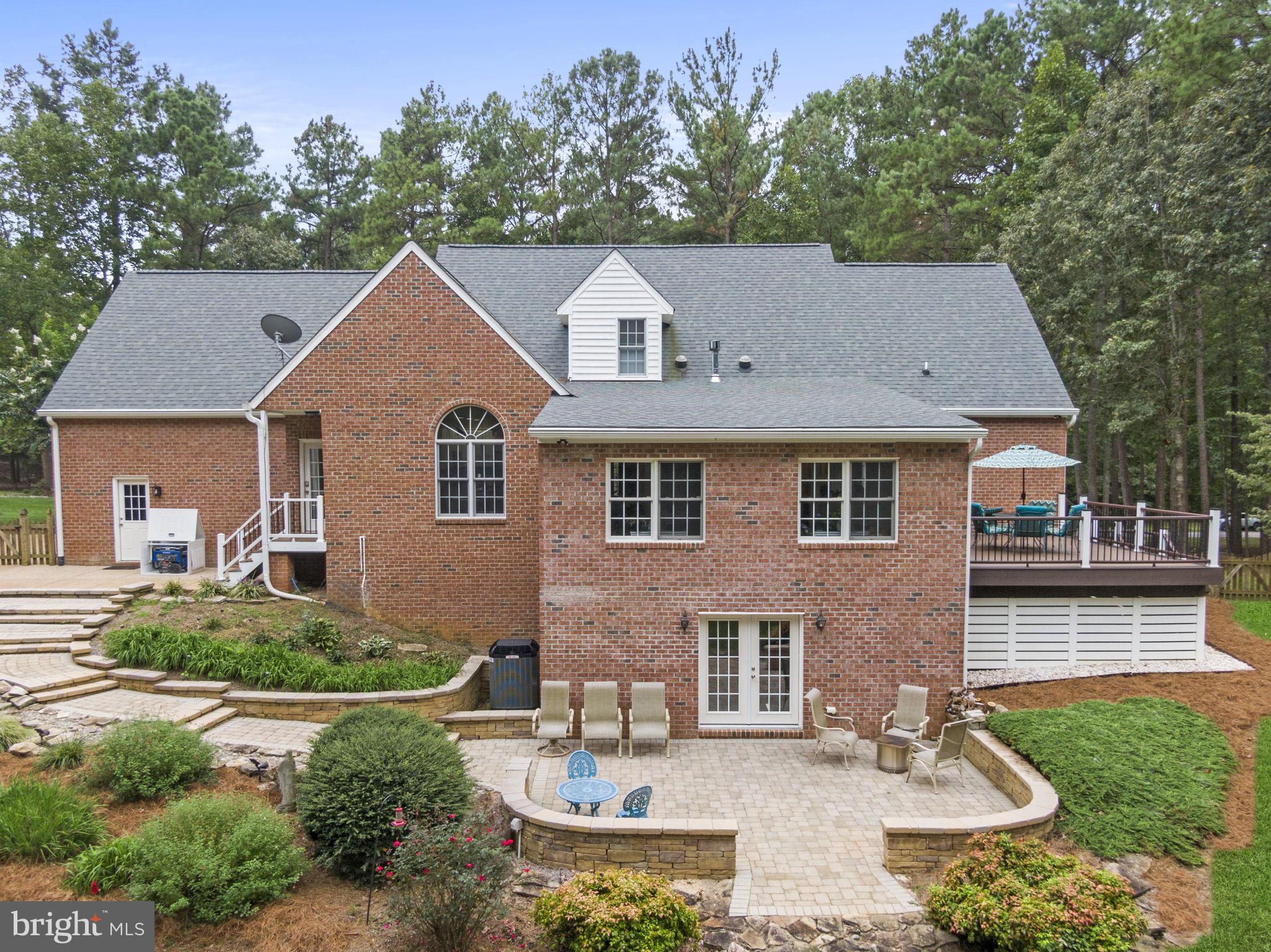 15130 Deep Spring Drive Montpelier, VA 23192 - Photo 8 of 66 a front view of a house with garden