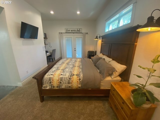 173 West Bryan Street Union, OR 97883 - Photo 12 of 32 a bed room with a bed and a television