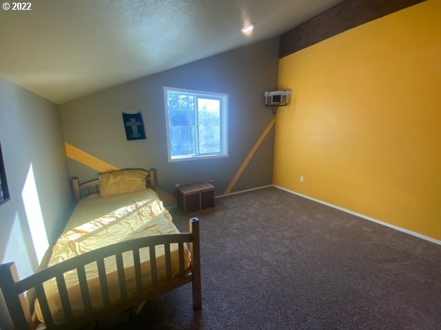 173 West Bryan Street Union, OR 97883 - Photo 25 of 32 a bed room with furniture and a window