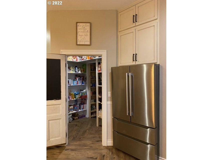 173 West Bryan Street Union, OR 97883 - Photo 9 of 32 a kitchen with stainless steel appliances granite countertop a refrigerator and a stove