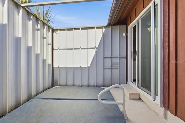 a view of a livingroom with furniture and front door