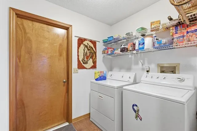 a view of a door and chair in front of a door