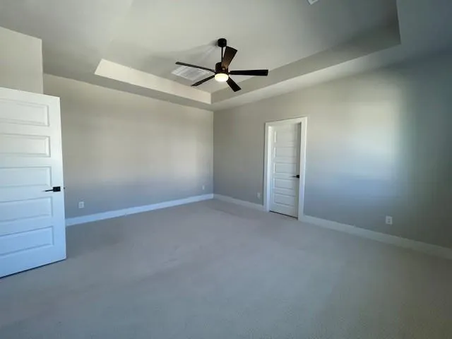 a view of a hallway with a white walls