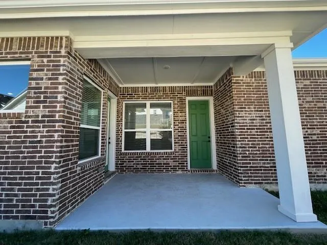 a bathroom with a tub a sink and a shower