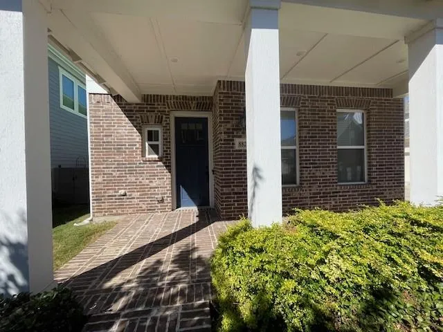 a view of house with backyard