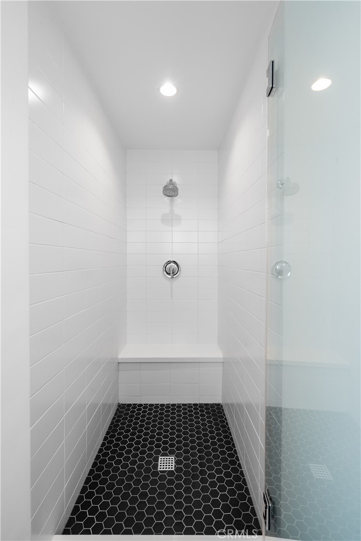 616 Acacia Avenue Corona del Mar, CA 92625 - Photo 13 of 20 a bathroom with a sink and a shower