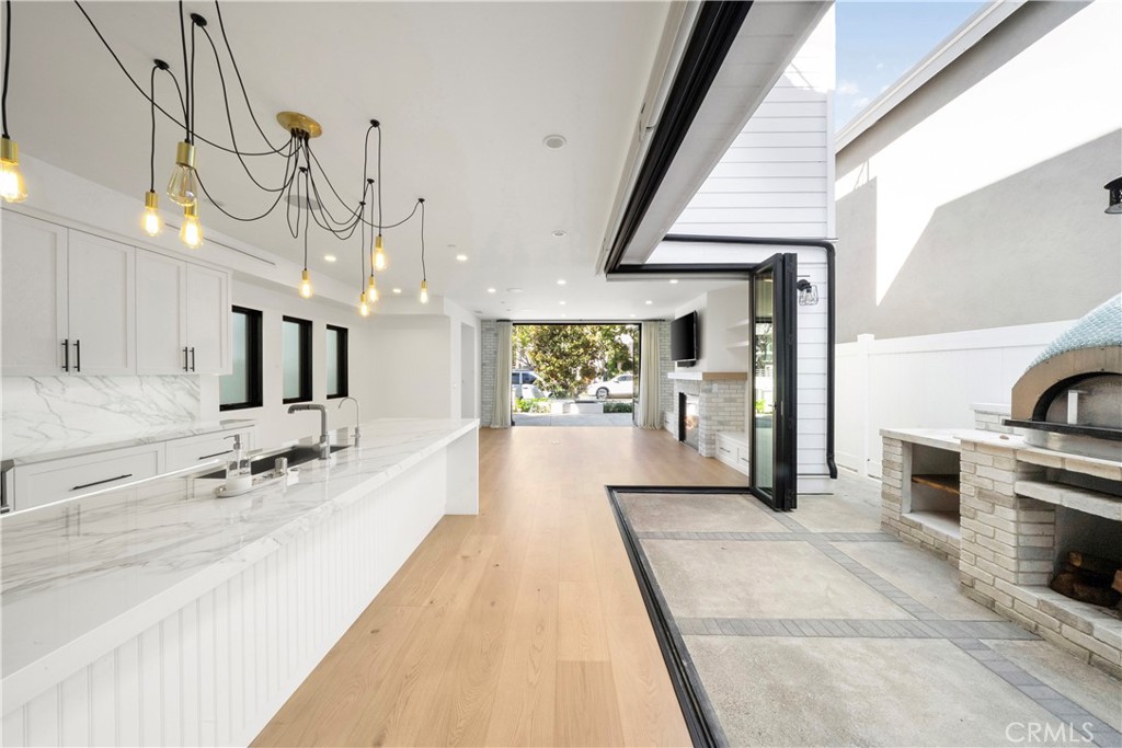 616 Acacia Avenue Corona del Mar, CA 92625 - Photo 3 of 20 a large white kitchen with a large window