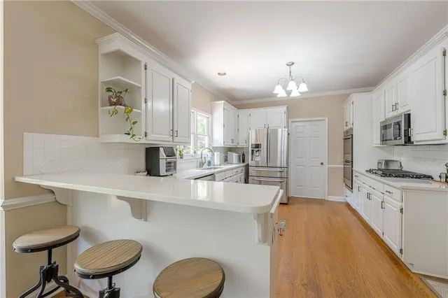 $580,000 | 1765 Pinetree Pass Lane Southwest, Lilburn, GA 30047