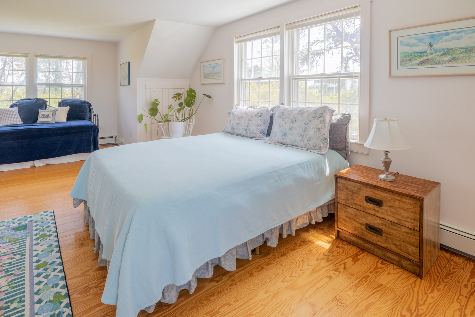 15 Swift Rock Road Nantucket, MA 02554 - Photo 24 of 32 a bed sitting in a bedroom next to a window