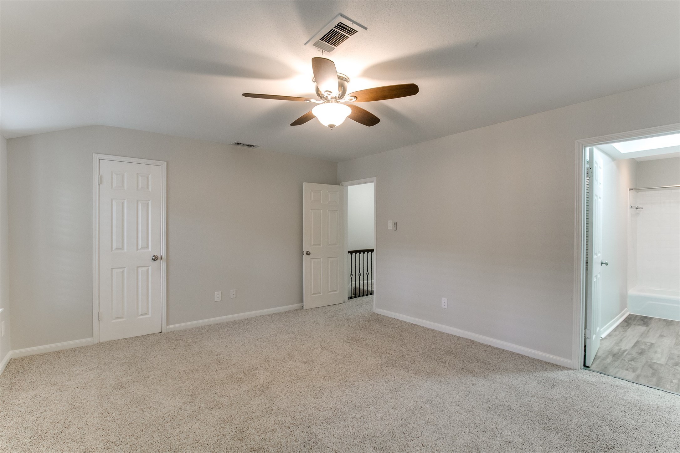 1407 Springrock Lane Houston, TX 77055 - Photo 11 of 25 Plush carpeting gives this room a cozy feel just right to rest and relax from a full day.