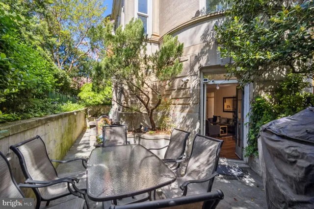 a view of outdoor sitting area with furniture