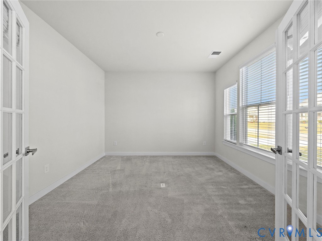 12029 Almer Lane Chester, VA 23836 - Photo 11 of 50 a view of an empty room with a window