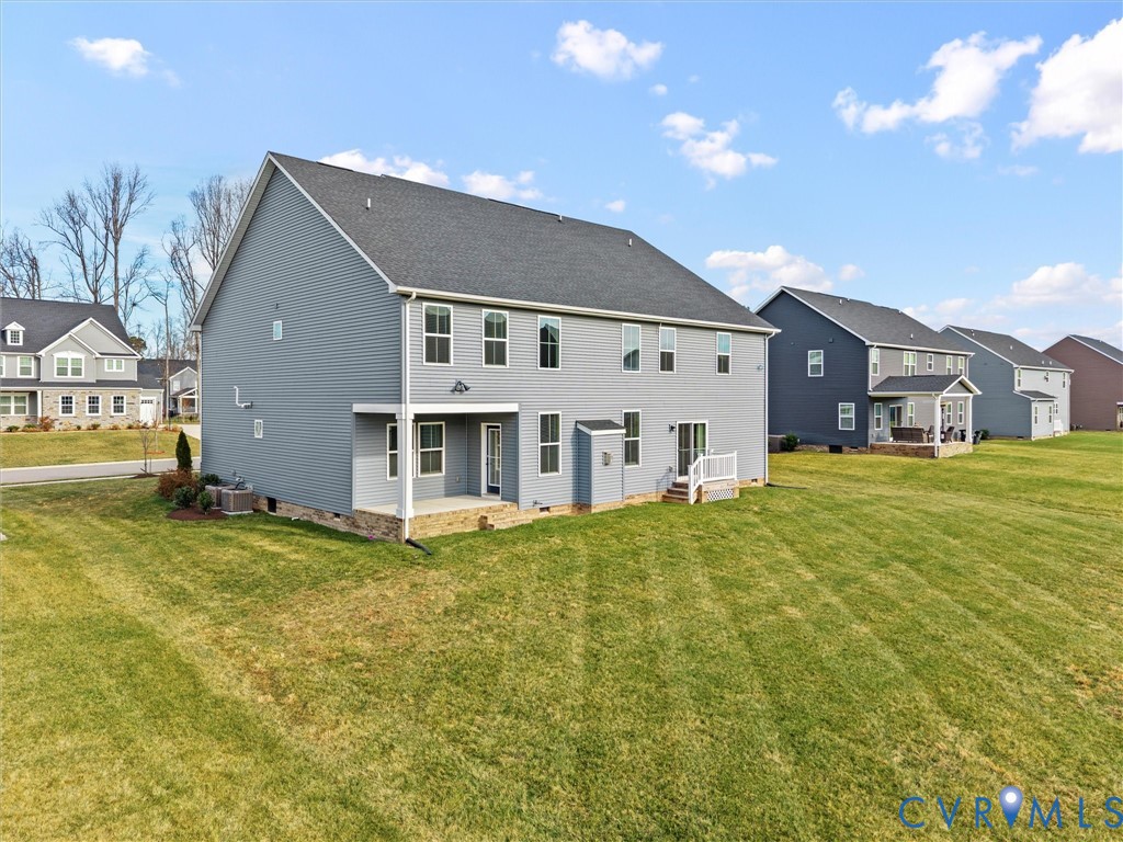 12029 Almer Lane Chester, VA 23836 - Photo 46 of 50 a front view of a house with a yard