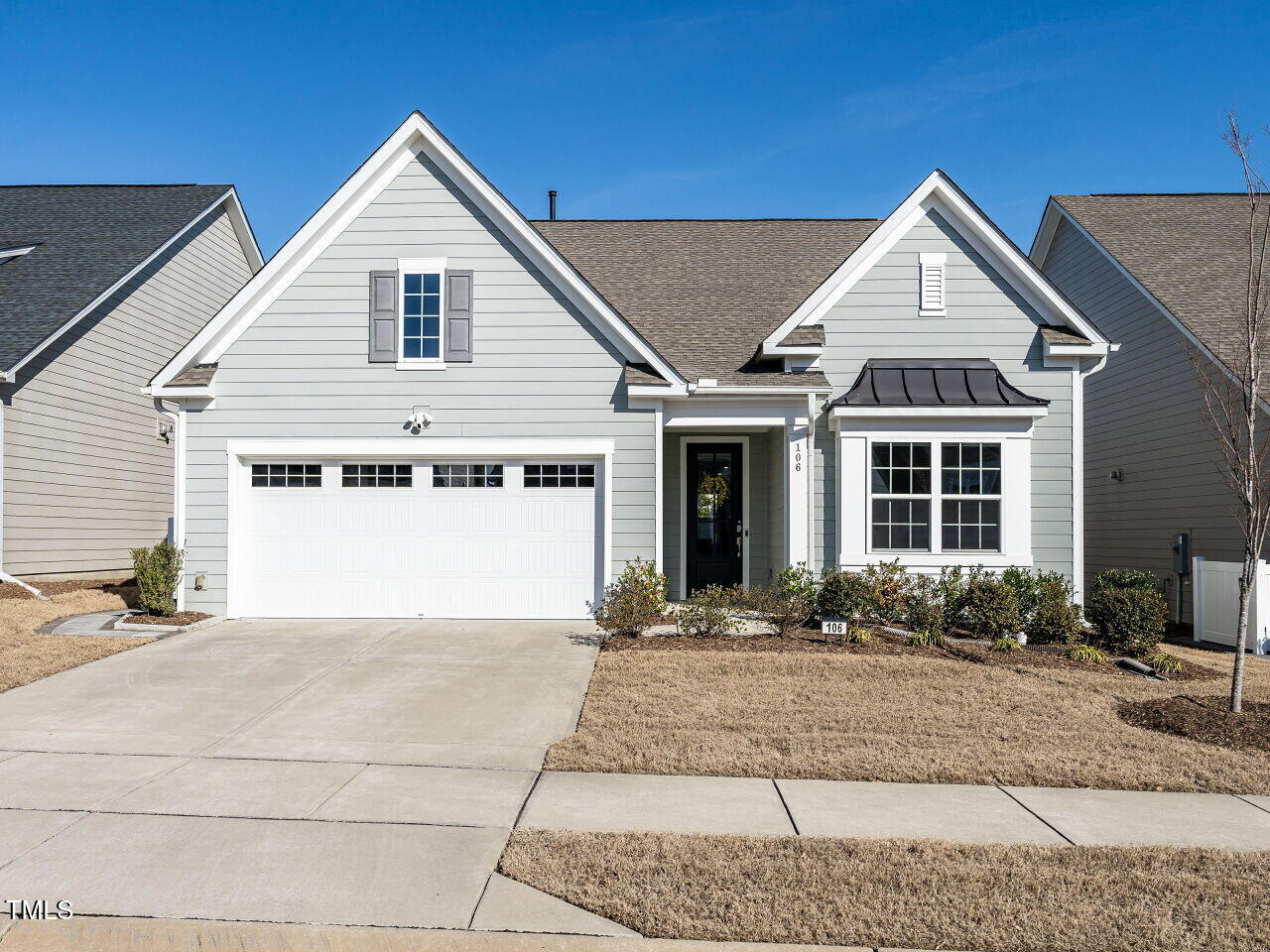 106 Ivory Lane Raleigh, NC 27610 - Photo 1 of 46 a front view of a house with garden