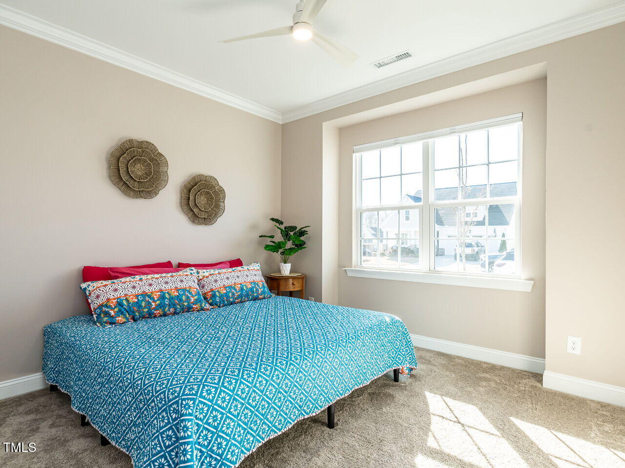 106 Ivory Lane Raleigh, NC 27610 - Photo 24 of 46 a bedroom with a bed and window