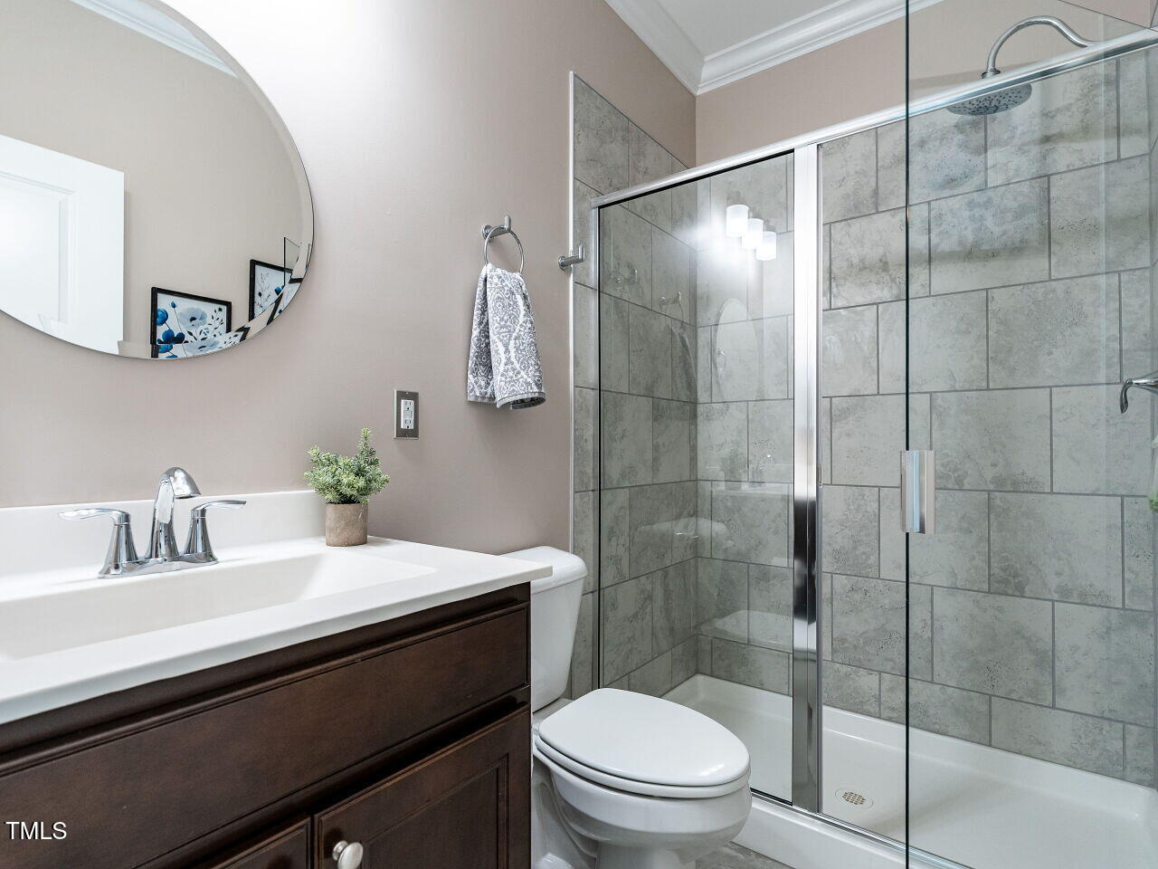 106 Ivory Lane Raleigh, NC 27610 - Photo 25 of 46 a bathroom with a sink toilet and shower