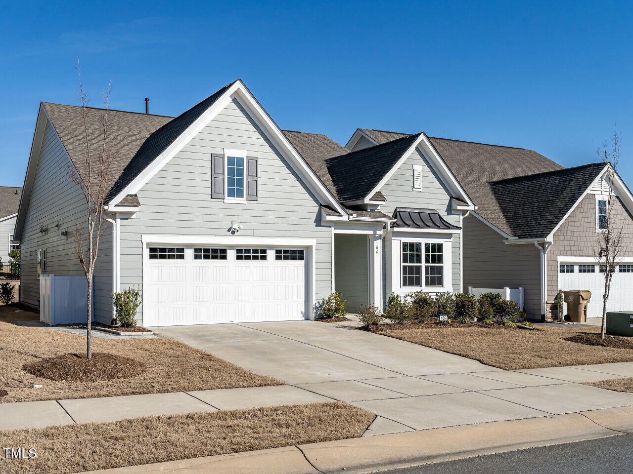 106 Ivory Lane Raleigh, NC 27610 - Photo 44 of 46 a front view of a house with a garden