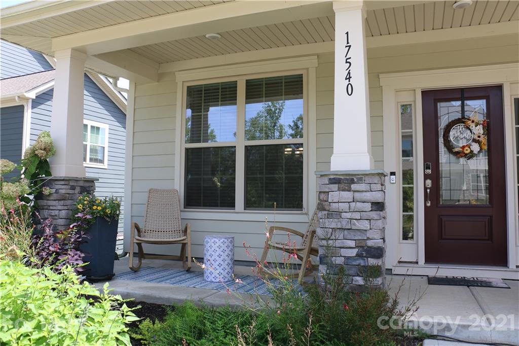 17540 Shearer Road Davidson, NC 28036 - Photo 2 of 27 a view of a bench in front of house