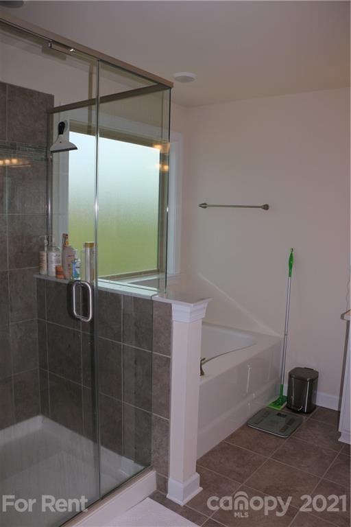 17540 Shearer Road Davidson, NC 28036 - Photo 14 of 27 a bathroom with a shower