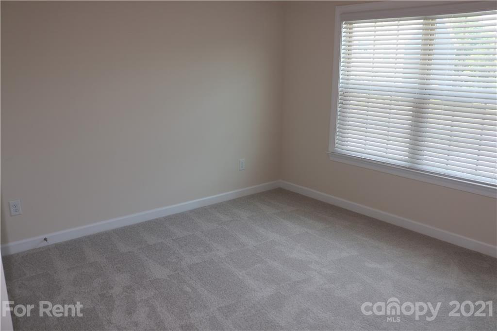 17540 Shearer Road Davidson, NC 28036 - Photo 22 of 27 an empty room with a window