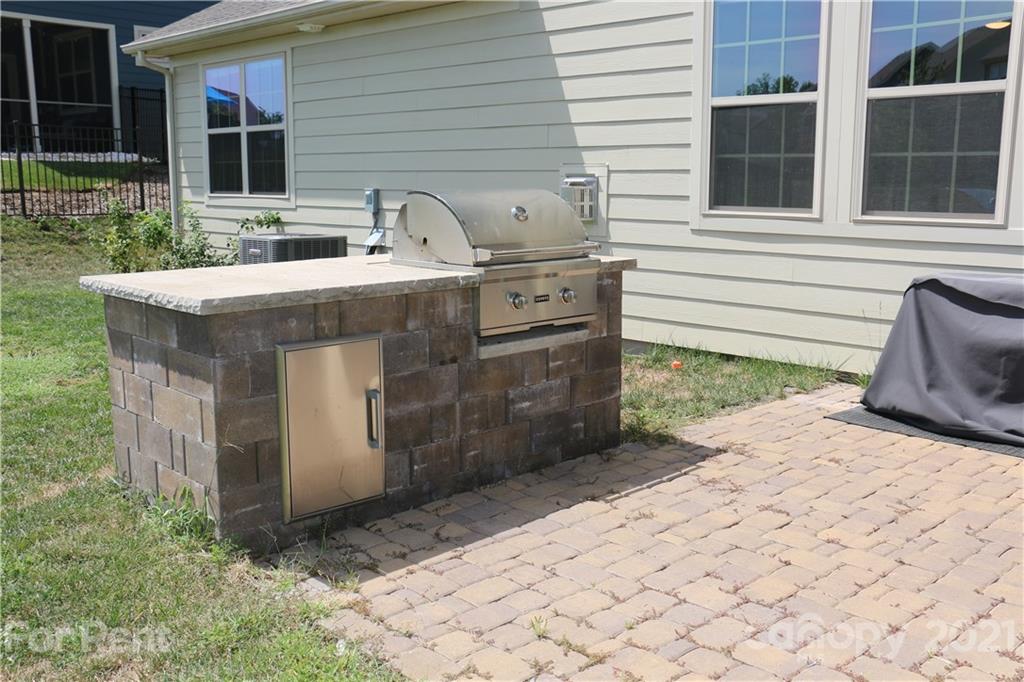 17540 Shearer Road Davidson, NC 28036 - Photo 24 of 27 a front view of a house with a yard