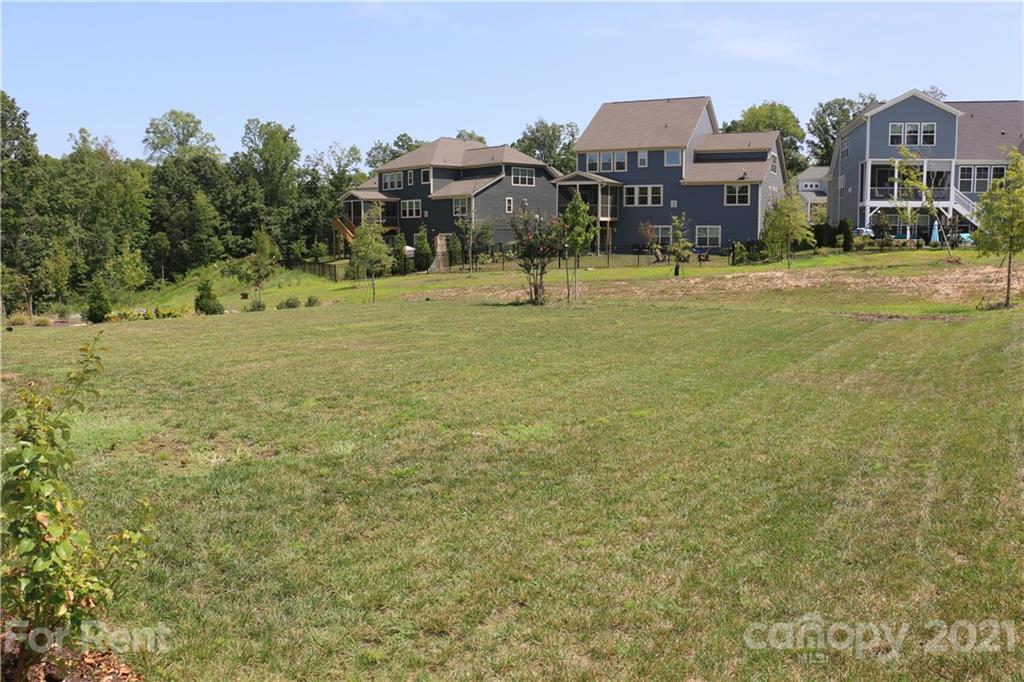 17540 Shearer Road Davidson, NC 28036 - Photo 27 of 27 a front view of a building with a yard