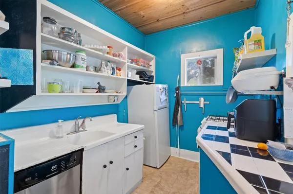a room with furniture and a wooden floor