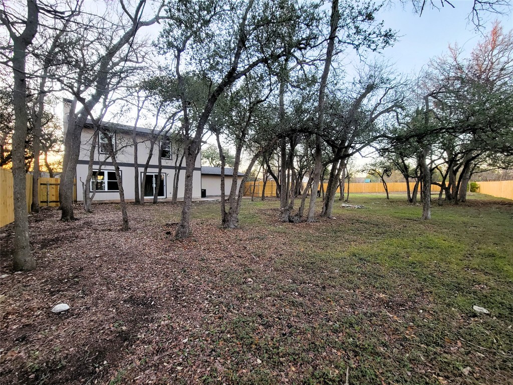 1900 Limerick Lane Leander, TX 78641 - Photo 5 of 12 View of fenced backyard and back of house on huge lot, endless possibilities