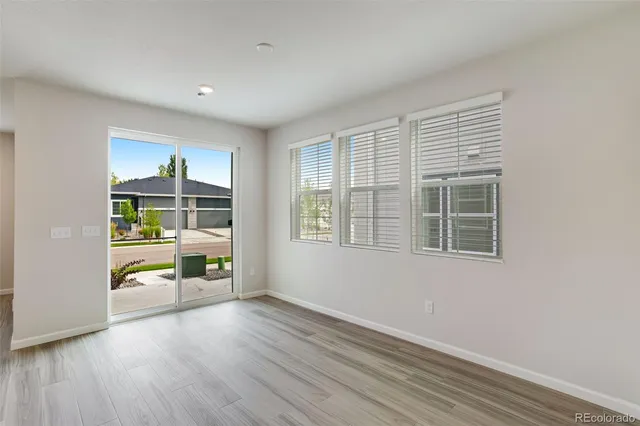 a view of kitchen with wooden floor