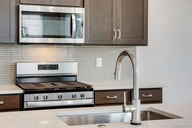 a view of hallway with window and entryway